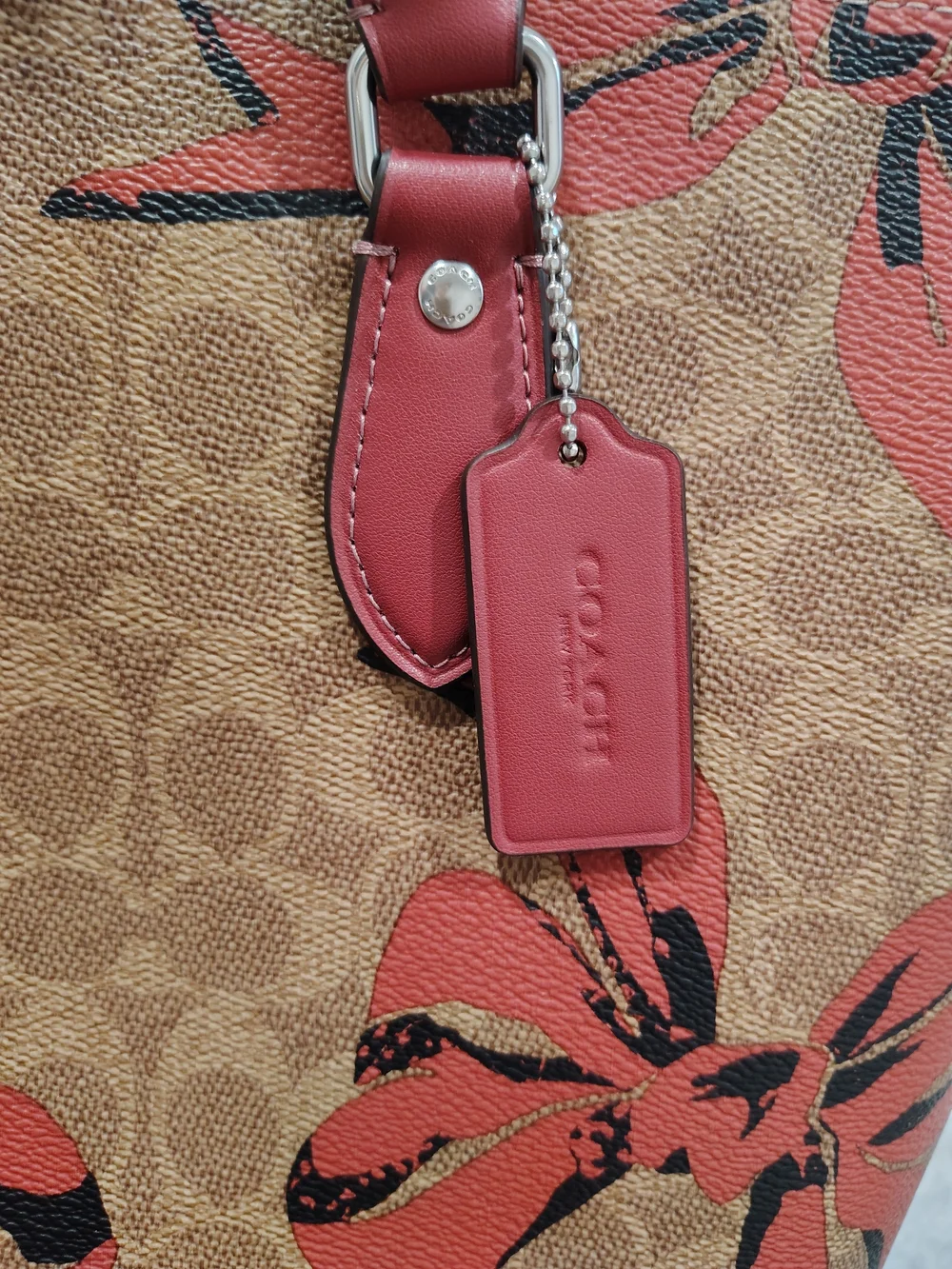 Coach Brown Signature Tote with Pink Bow Accents